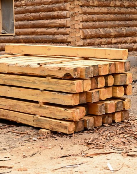 Stacks of firewood for industrial use..The firewood is stacked for the winter in a pile of logs. Stacks of firewood for industrial use..The firewood is stacked for the winter in a pile of logs.